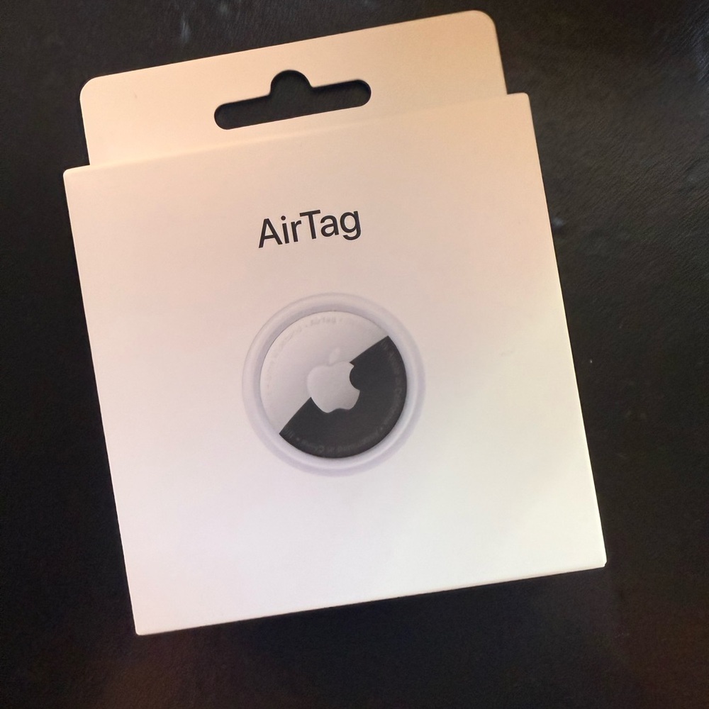 Apple Device Packaging with White and Black Design
